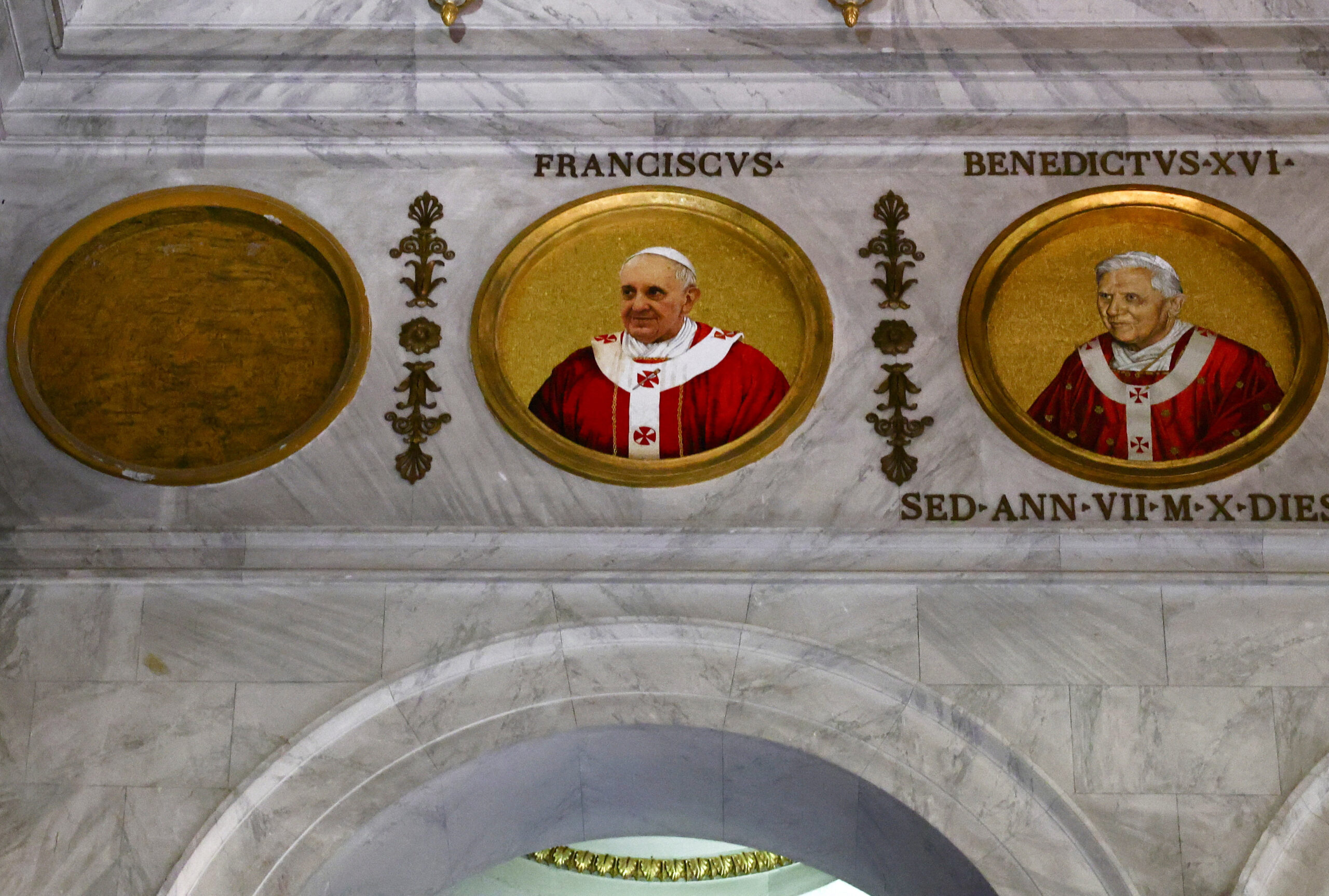 A mosaic depicting the late Pope Francis is displayed inside the Basilica of Saint Paul Outside the Walls
