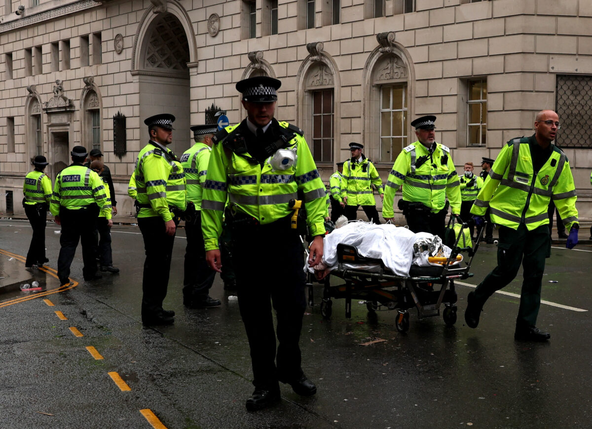 Liverpool fan is transferred to the hospital after injury