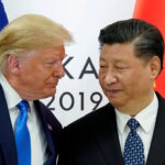 FILE PHOTO: Trump meets Xi at the G20 leaders summit in Osaka, Japan