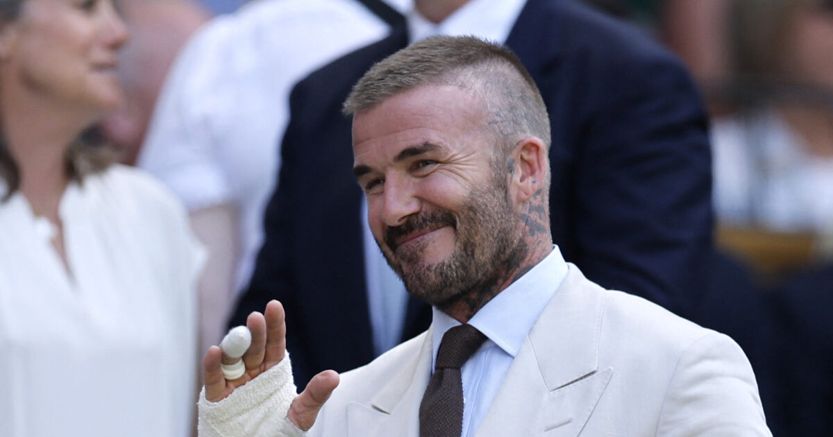 David Beckham with tied hand in Wimbledon