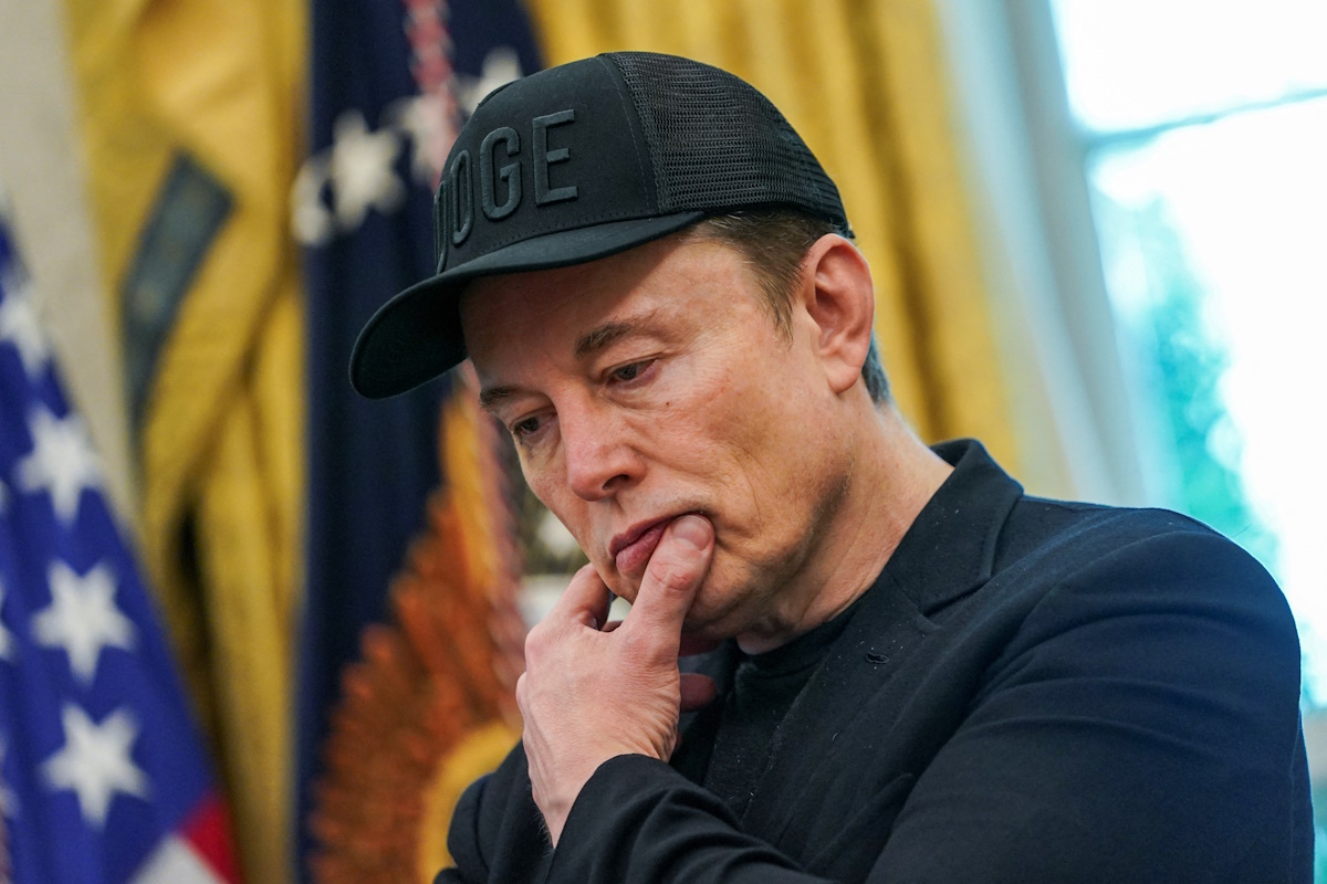 Elon Musk reacts during a press conference with U.S. President Donald Trump (not pictured), at the White House in Washington, D.C., U.S., May 30, 2025. REUTERS