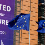 European Union flags flutter outside the European Commission