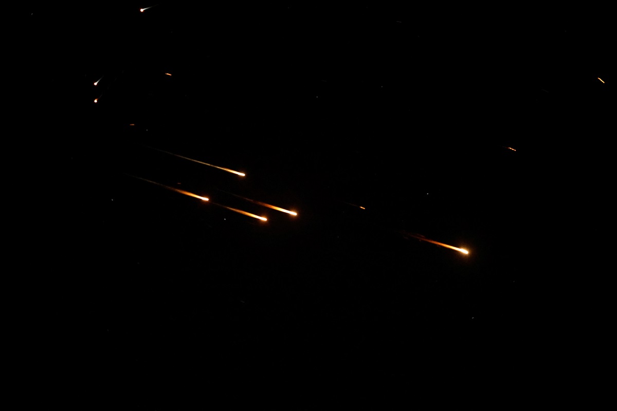 Missiles launched from Iran are seen from Tubas, in the Israeli-occupied West Bank, June 13, 2025. REUTERS