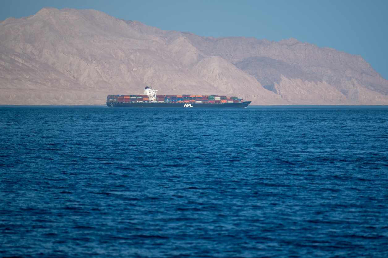 Iranian coastline near the Strait of Hormuz. giant sea container ship in the strait of Hormuz. Near East