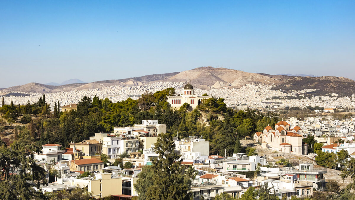 High angle view of National Observatory of Athens (Thissio Visitor Center) and Church of Agia Marina in Athens, Greece.