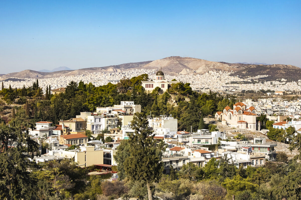 High angle view of National Observatory of Athens (Thissio Visitor Center) and Church of Agia Marina in Athens, Greece.