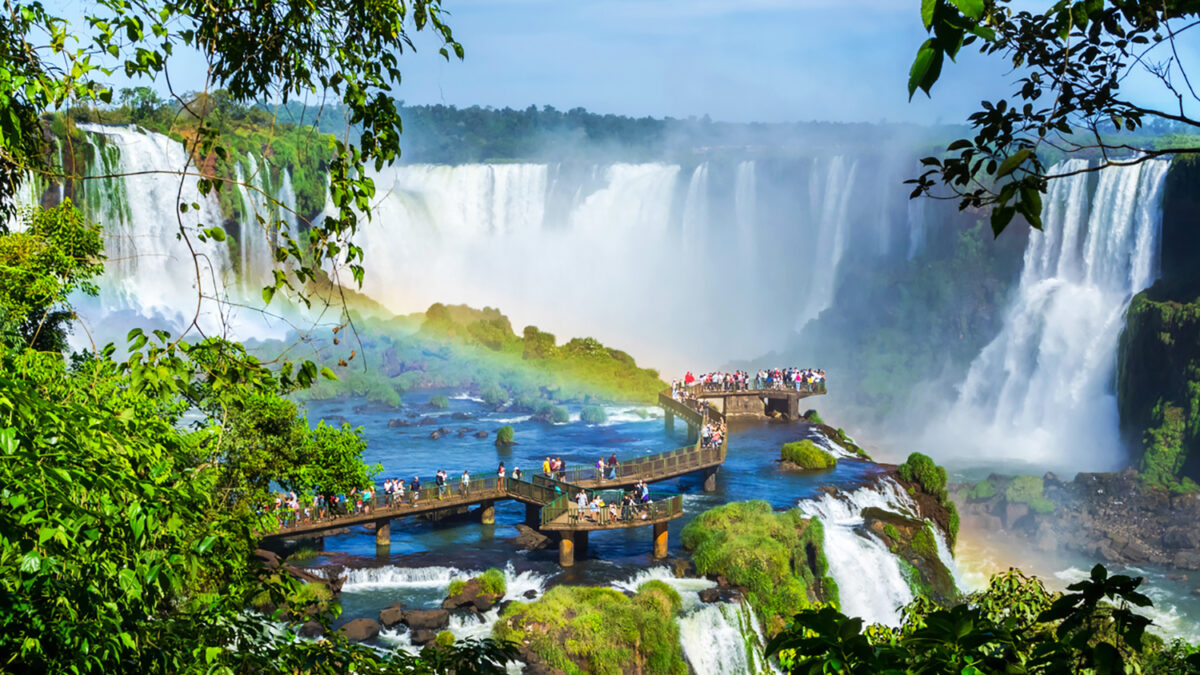 Tourists at Iguazu Falls, one of the world's great natural wonders, near the border of Argentina and Brazil.