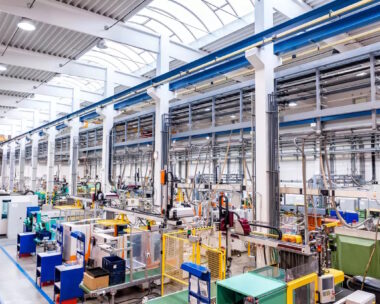 Color image of futuristic new factory producing plastic pieces for car industry