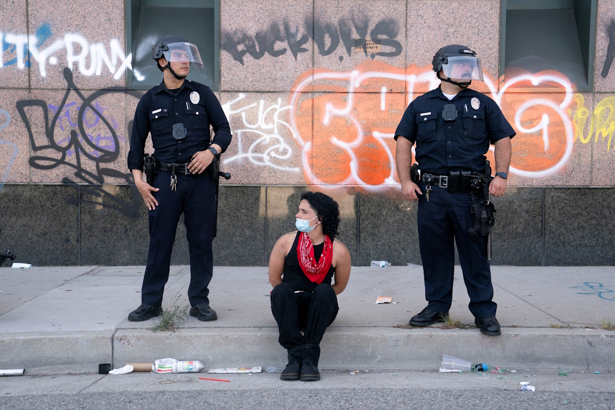 Demonstrator in the hands of the police