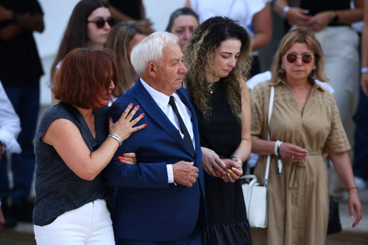 Grandfather of Liverpool's Portuguese soccer player Diogo Jota and his brother Andre Silva, who died in a car crash near Zamora, Spain, attends their funeral ceremony at the Chapel of the Resurrection, in Gondomar, Portugal, July 5, 2025. REUTERS