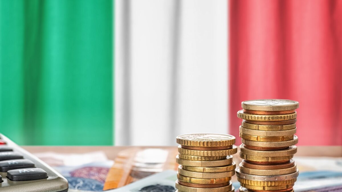 Euro banknotes and coins in front of the national flag of Italy