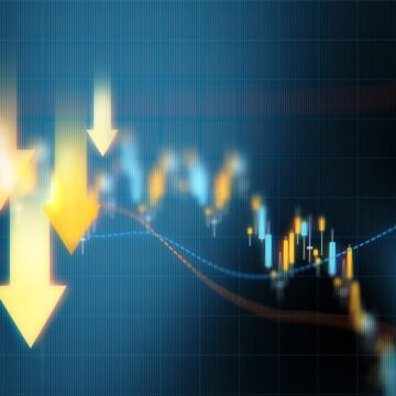 Down arrows over blue financial graph background. Horizontal composition with selective focus and copy space. Investment, stock market data and finance concept.