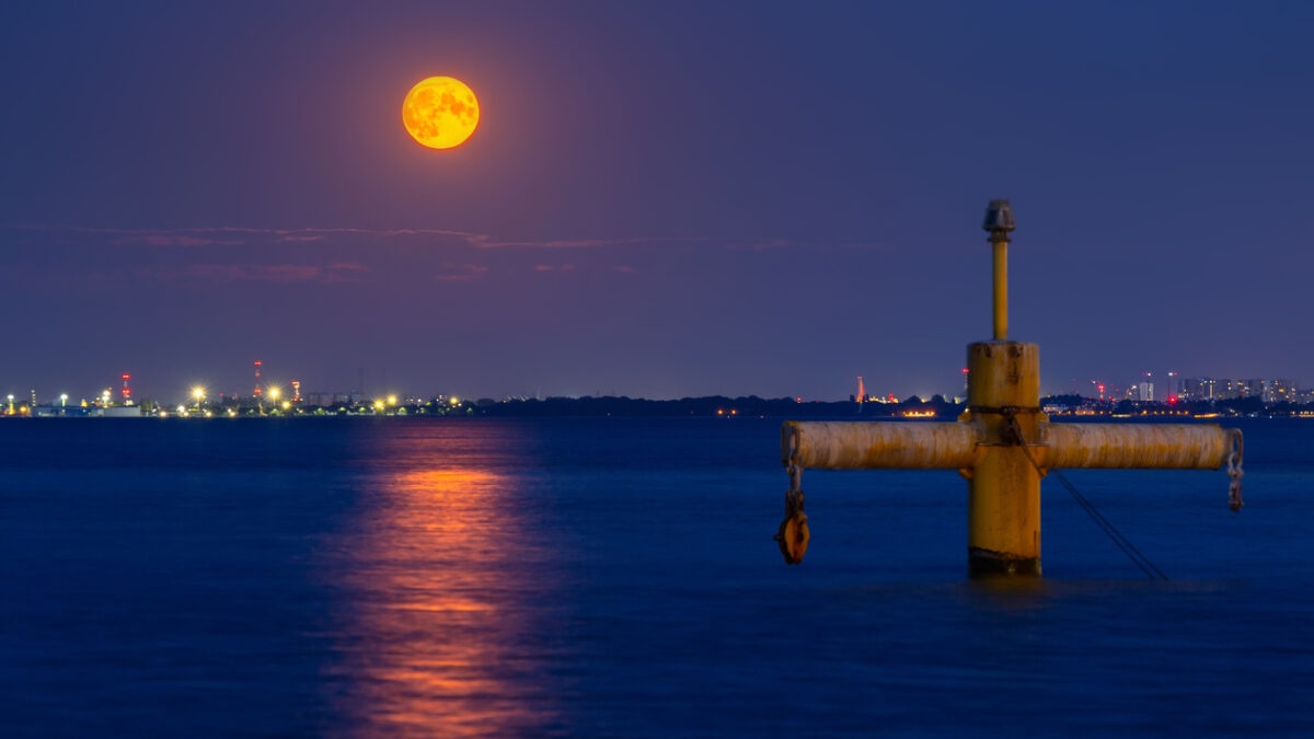 Full moon in July at Baltic Sea in Gdynia Orlowo. Poland