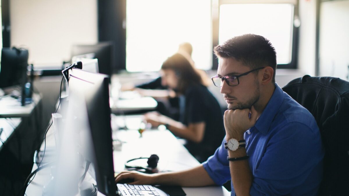 Computer programmer working on new software program