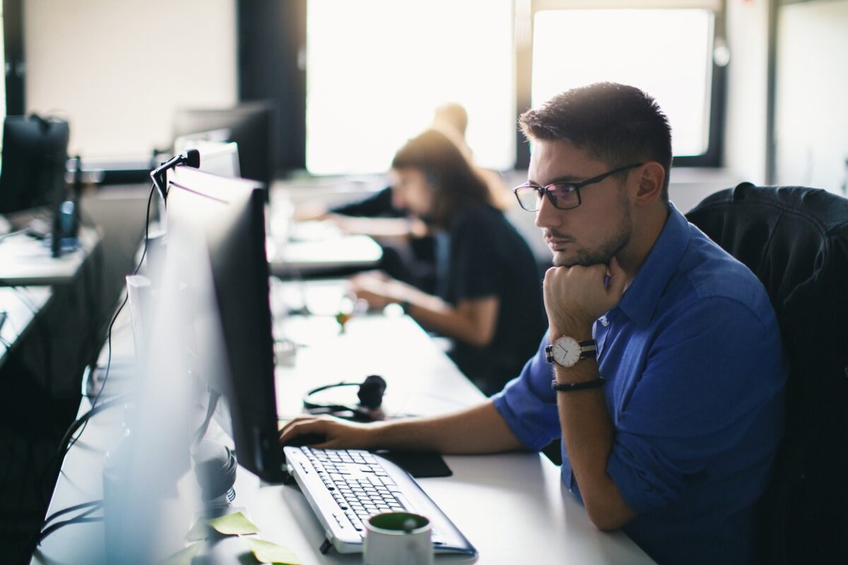 Computer programmer working on new software program
