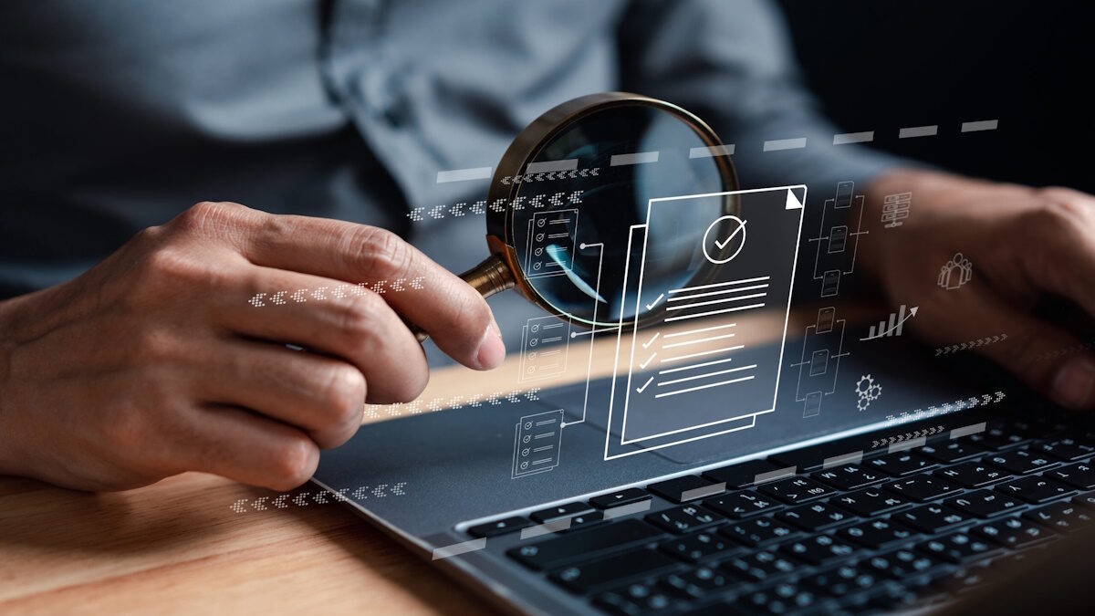 Businessman Inspecting Paperwork Document of Business Data Analysis working Management report with KPI and metrics connected to database. Corporate strategy for finance, operations, sales, marketing.