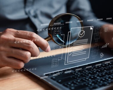 Businessman Inspecting Paperwork Document of Business Data Analysis working Management report with KPI and metrics connected to database. Corporate strategy for finance, operations, sales, marketing.