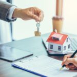 Real estate agent or real estate agent was holding the key to the new landlord