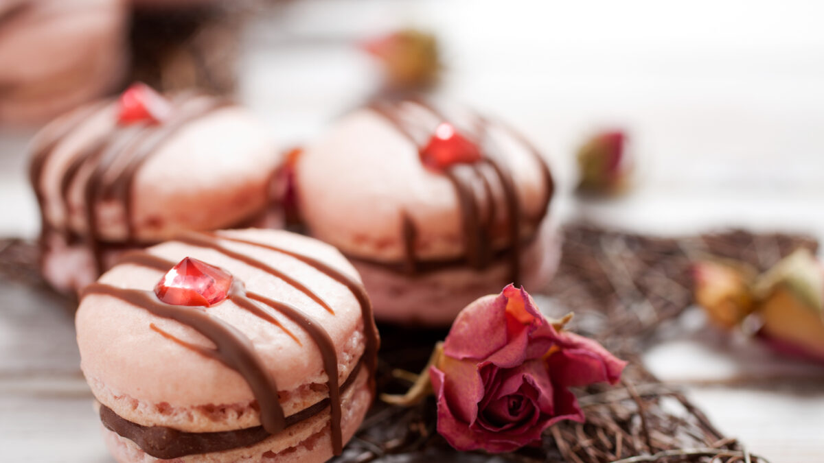 Pink macarons with chocolate and edible diamond