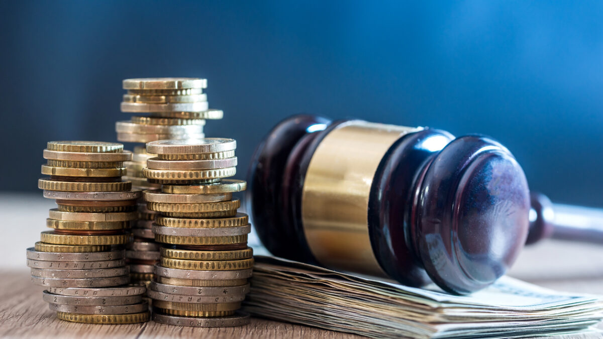 gavel with euro banknotes and coin. close up