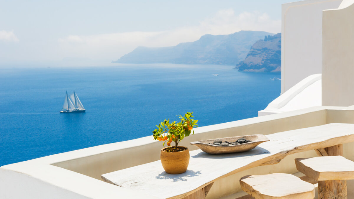 White architecture on Santorini island, Greece. Beautiful summer landscape, sea view.