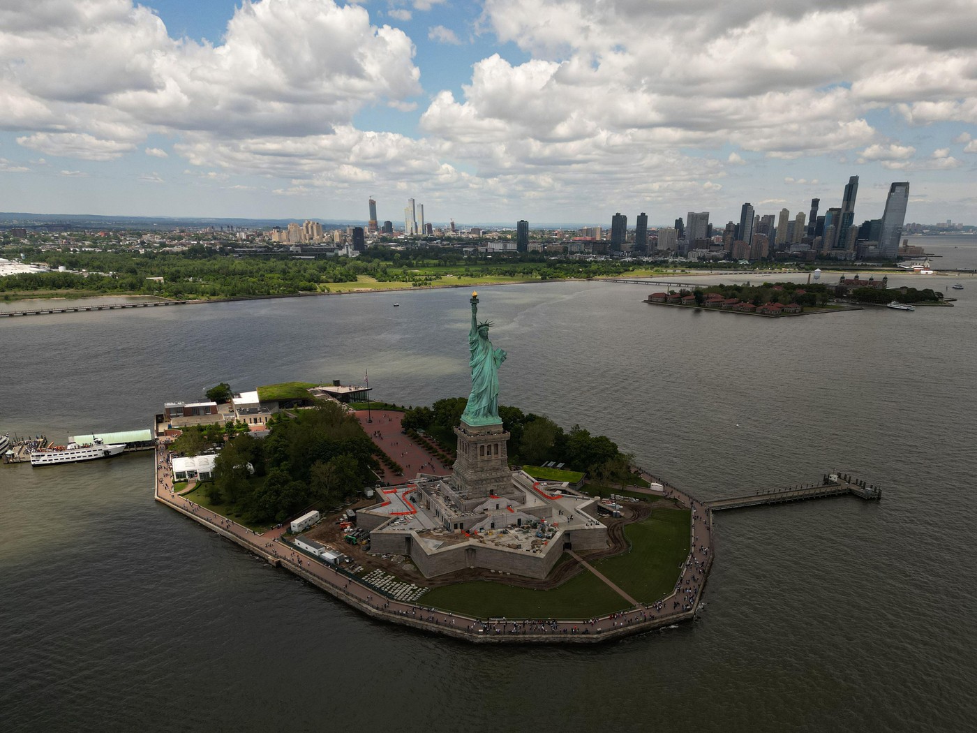 Statue of Liberty over the Panorama of New York