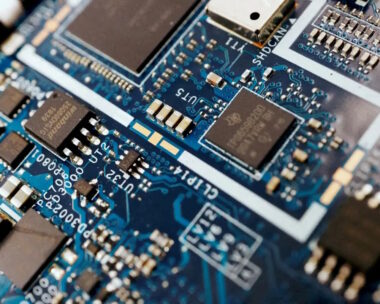 Semiconductor chips are seen on a circuit board of a computer