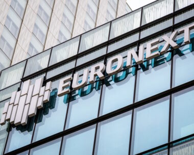 The Euronext stock exchange logo at the company's headquarters in the Paris financial district of La Defense, France, 23 March 2023. Euronext is a pan-European market infrastructure, connecting European economies to global capital markets. It operates regulated exchanges in Belgium, France, Ireland, Italy, the Netherlands, Norway and Portugal.