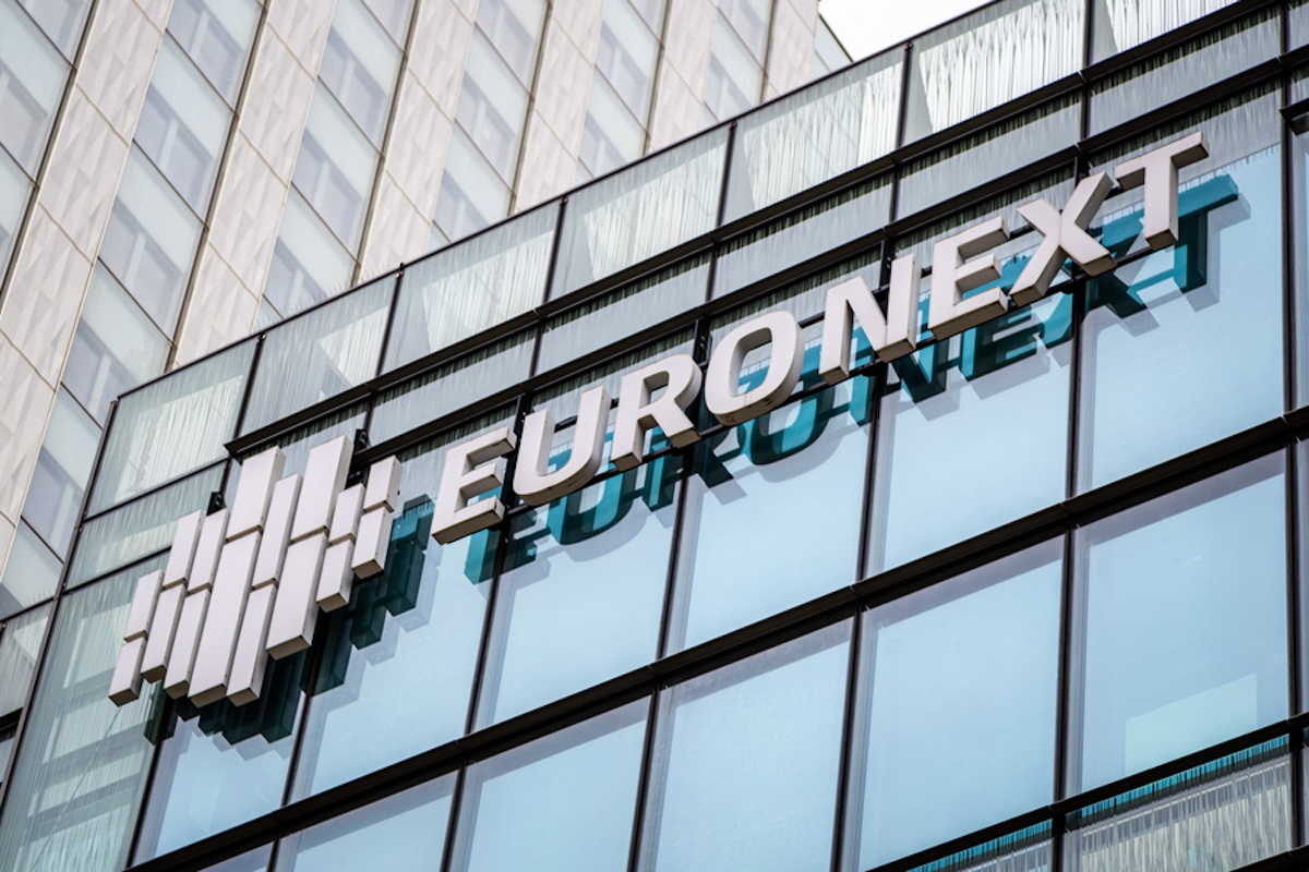 The Euronext stock exchange logo at the company's headquarters in the Paris financial district of La Defense, France, 23 March 2023. Euronext is a pan-European market infrastructure, connecting European economies to global capital markets. It operates regulated exchanges in Belgium, France, Ireland, Italy, the Netherlands, Norway and Portugal.