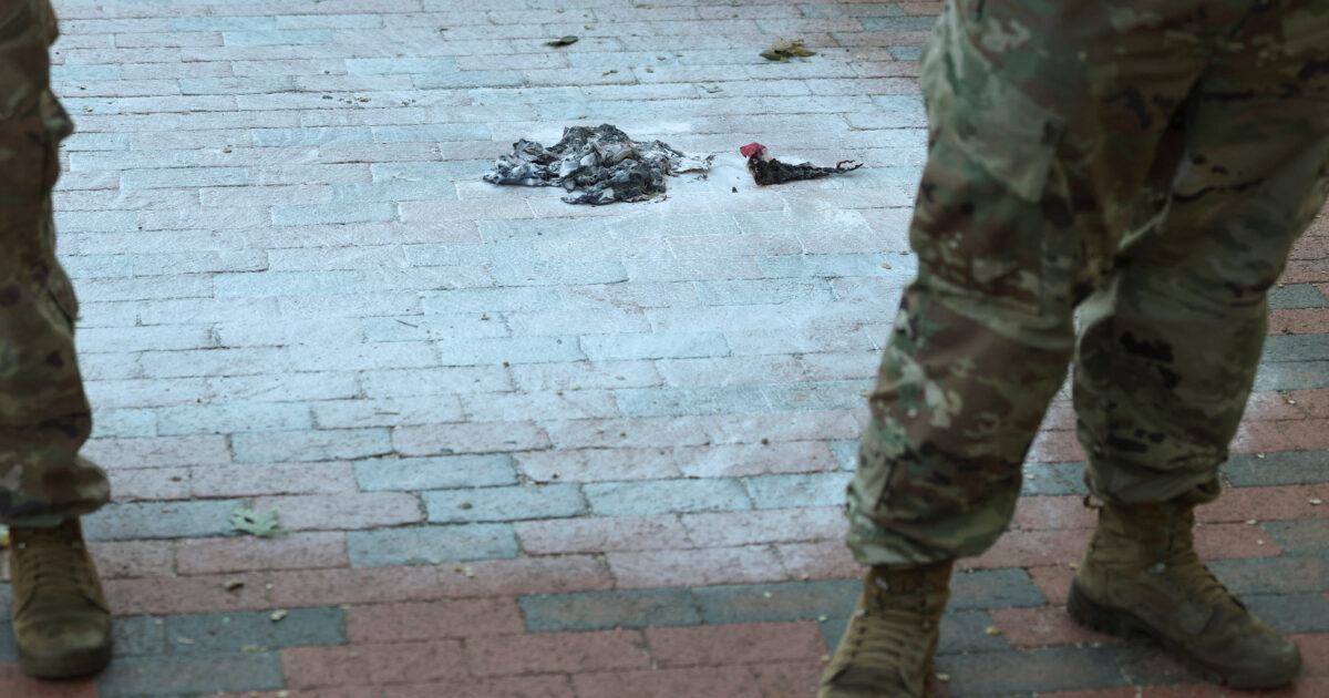 Arrest of a protester who set fire to US flag by defying Trump Declaration