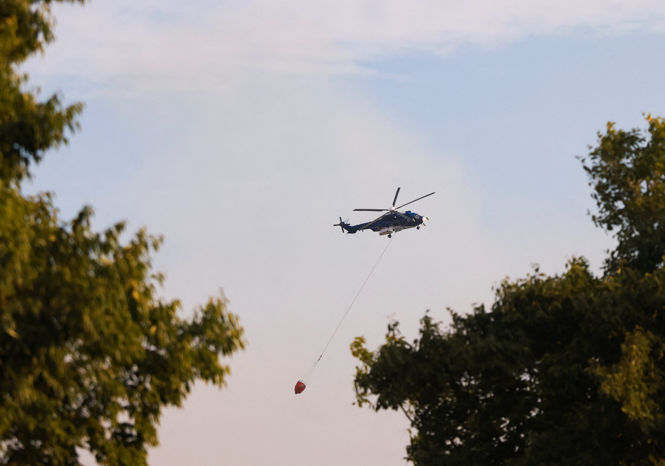 A helicopter flying during a fire near southern France