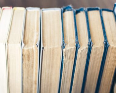 Stack of old book education concept background, many books piles with copy space for text