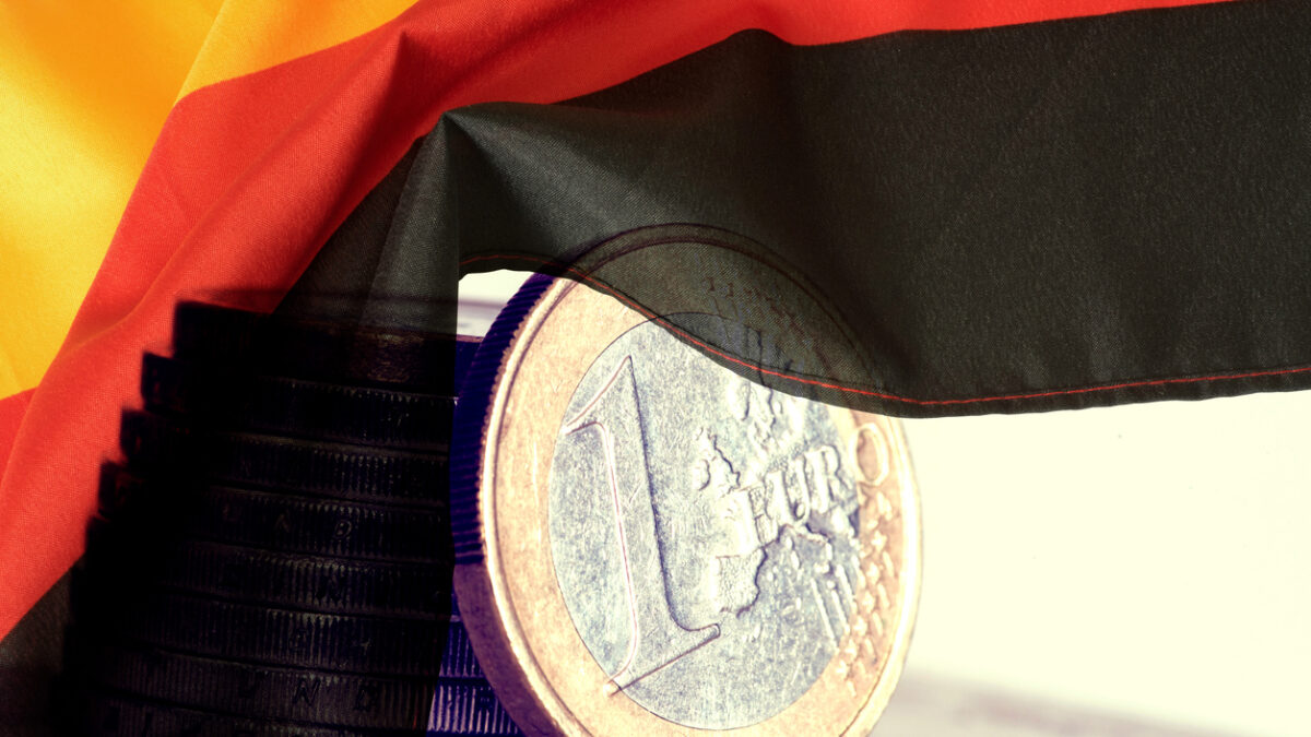 Flag of Germany and Euro coins