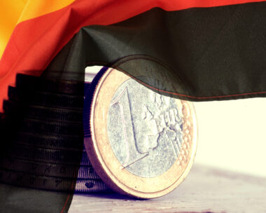 Flag of Germany and Euro coins