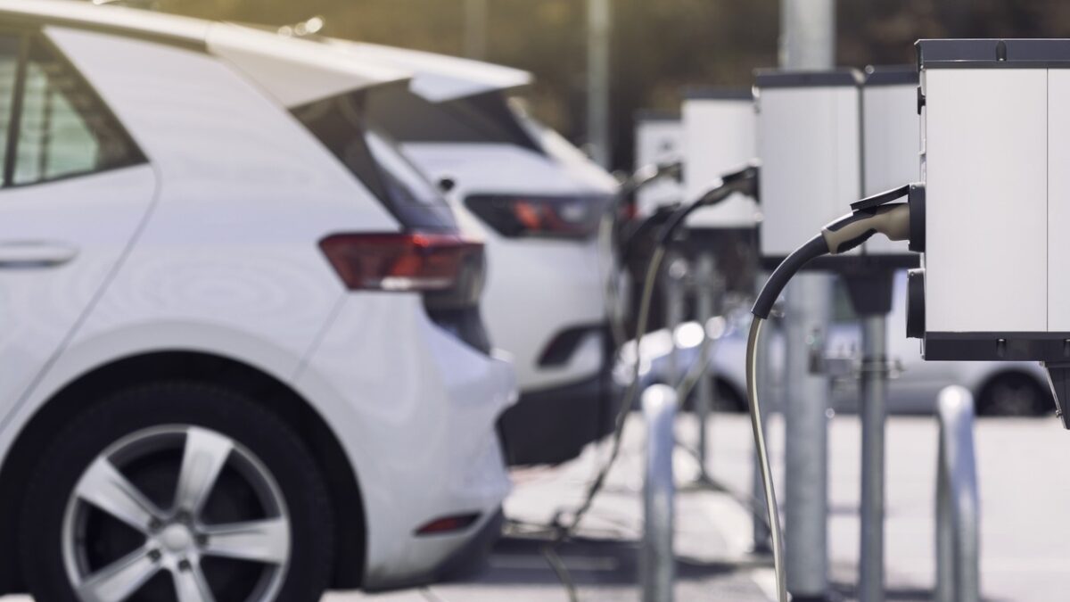 A parking lot with charging stations for electric cars.