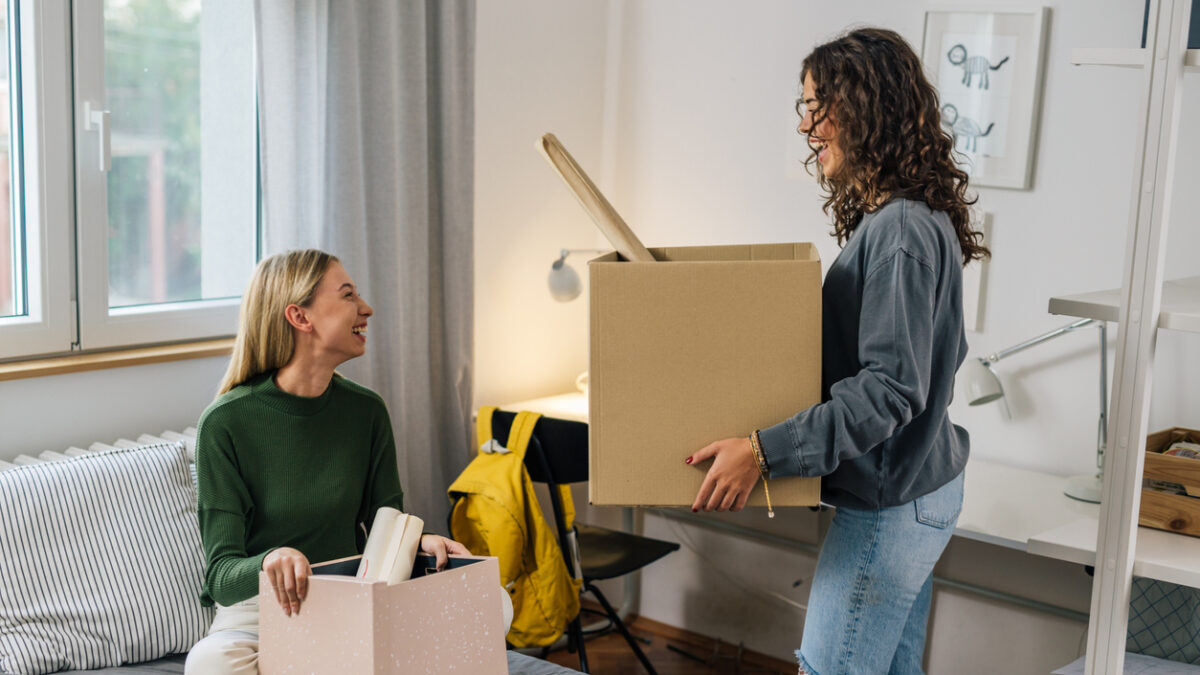 female college student move in dorm
