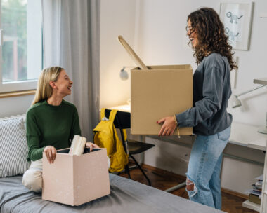 female college student move in dorm