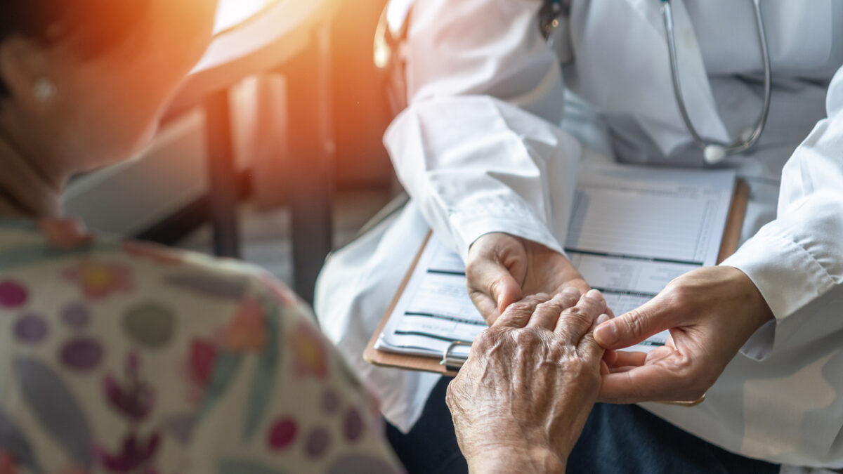 Parkinson disease patient, Alzheimer elderly senior, Arthritis person's hand in support of geriatric doctor or nursing caregiver for hospice palliative care, disability awareness day, ageing society care service