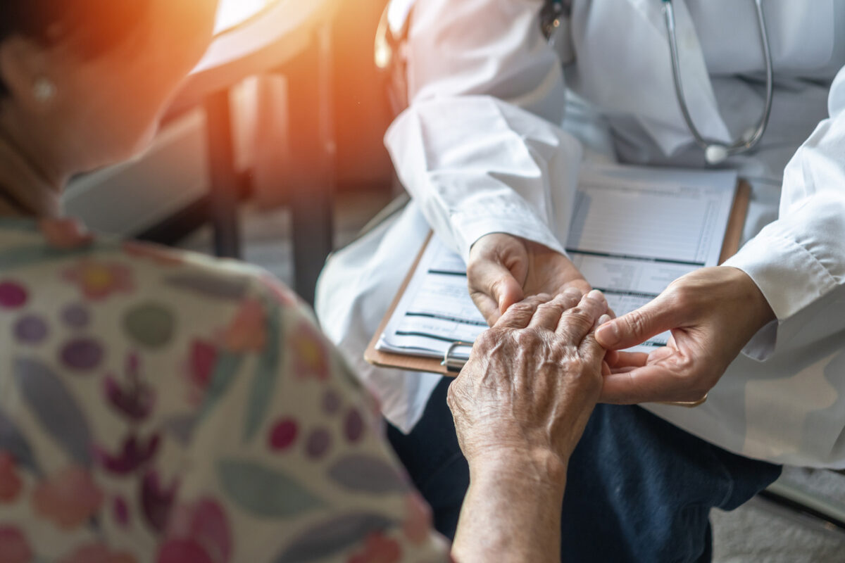 Parkinson disease patient, Alzheimer elderly senior, Arthritis person's hand in support of geriatric doctor or nursing caregiver for hospice palliative care, disability awareness day, ageing society care service
