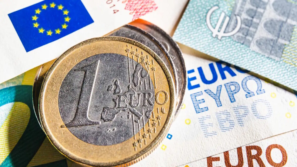 European money. Euro currency. Coins and banknotes. One Euro coin