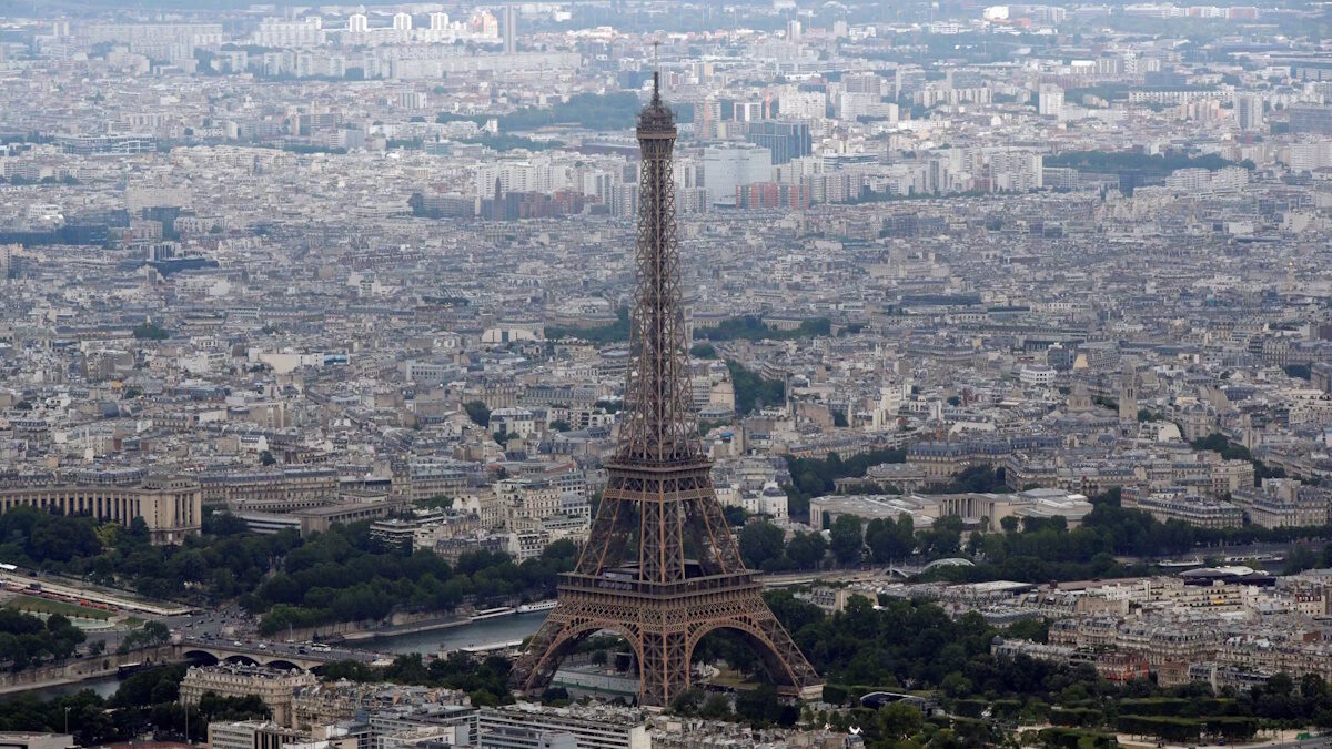 FILE PHOTO: An aerial view shows the Eiffel tower, the Seine River and the Paris skyline, France, July 14, 2019.