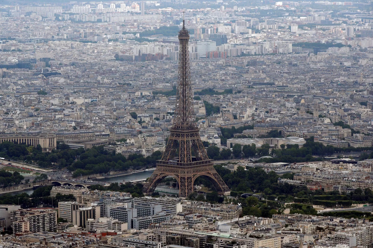 FILE PHOTO: An aerial view shows the Eiffel tower, the Seine River and the Paris skyline, France, July 14, 2019.