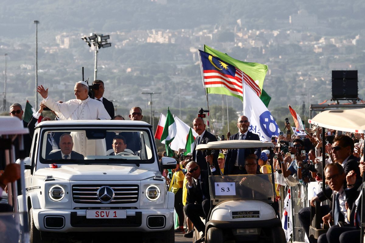 Upon arrival of the Pope