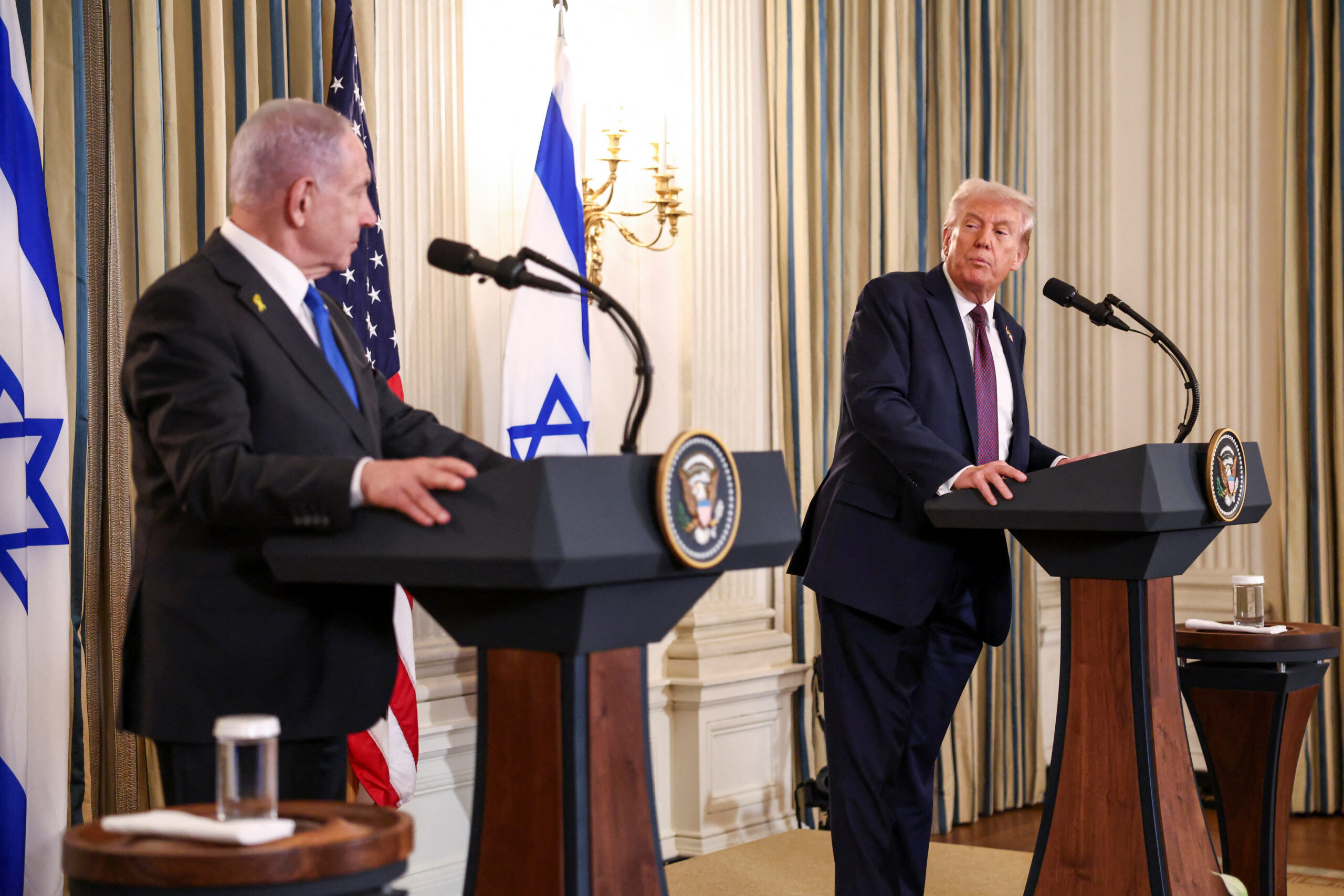 U.S. President Donald Trump and Israeli Prime Minister Benjamin Netanyahu hold a joint press conference in the State Dining Room at the White House, in Washington, D.C., U.S., September 29, 2025. REUTERS/Kevin Lamarque