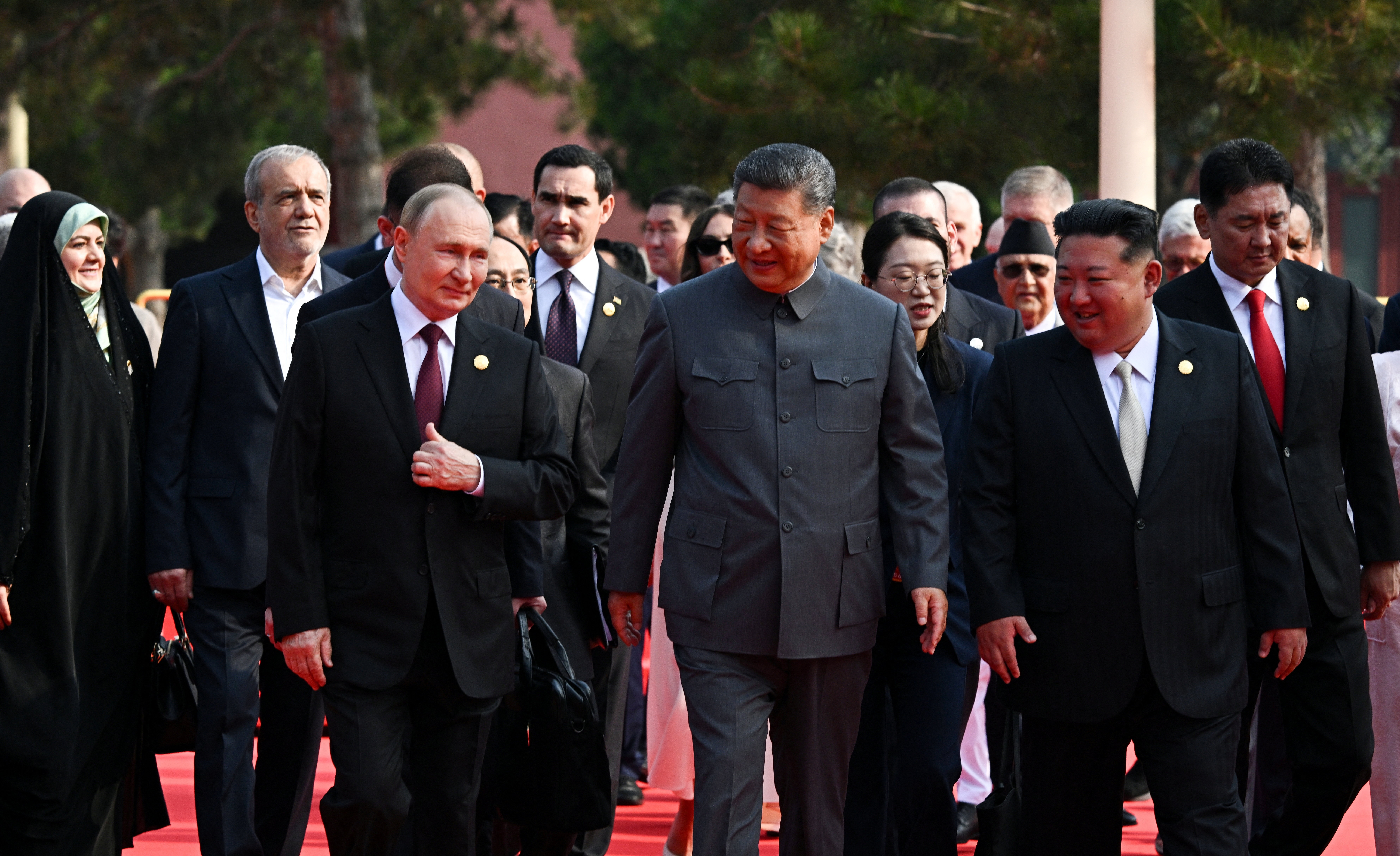 Xi Jing, Vladimir Putin and Kim Jong Un during the military parade in Beijing