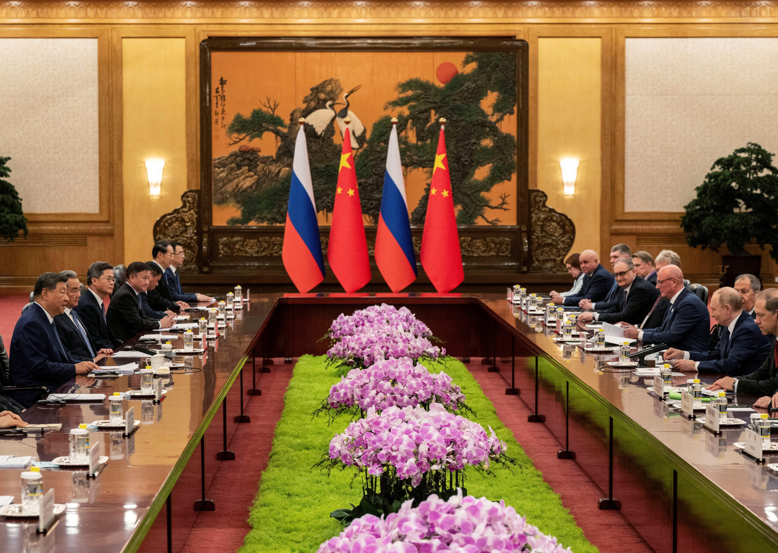 Chinese President Xi Jinping speaks at the beginning of the bilateral meeting with Russian President Vladimir Putin in the great hall of the people in Beijing