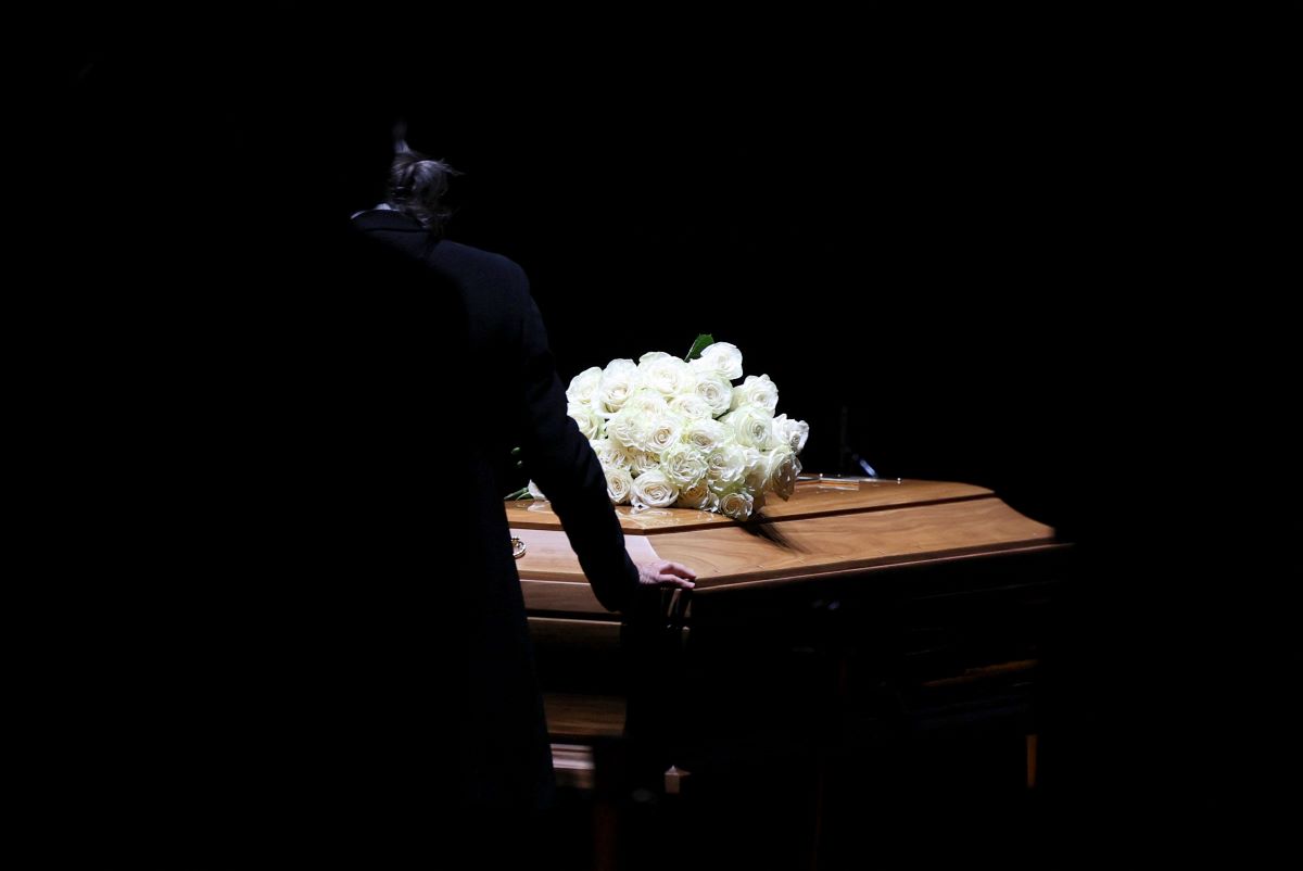 The coffin with the body of George Armani