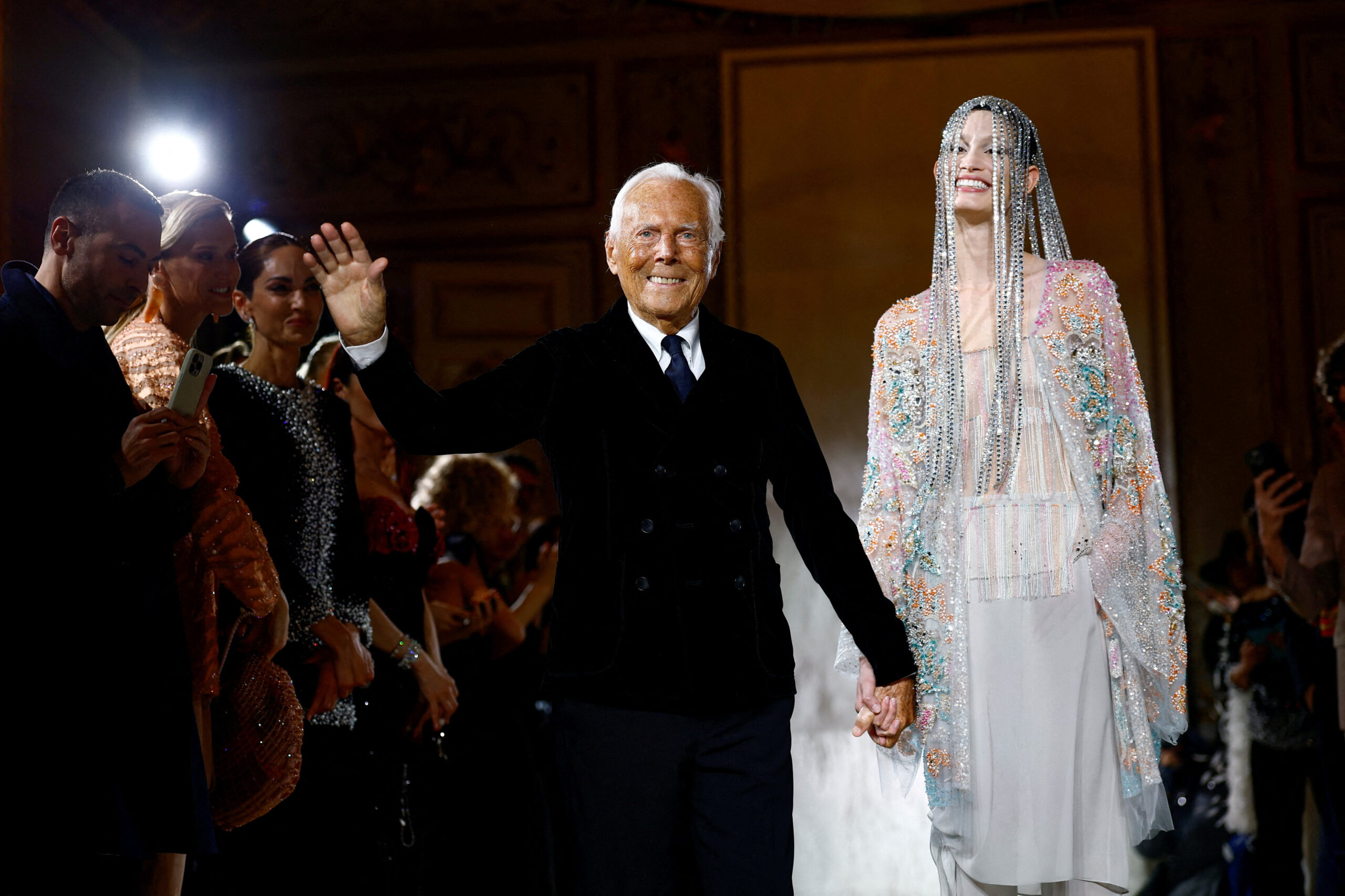 FILE PHOTO: Designer Giorgio Armani appears at the end of his Haute Couture Spring/Summer 2025 collection show for Giorgio Armani Prive