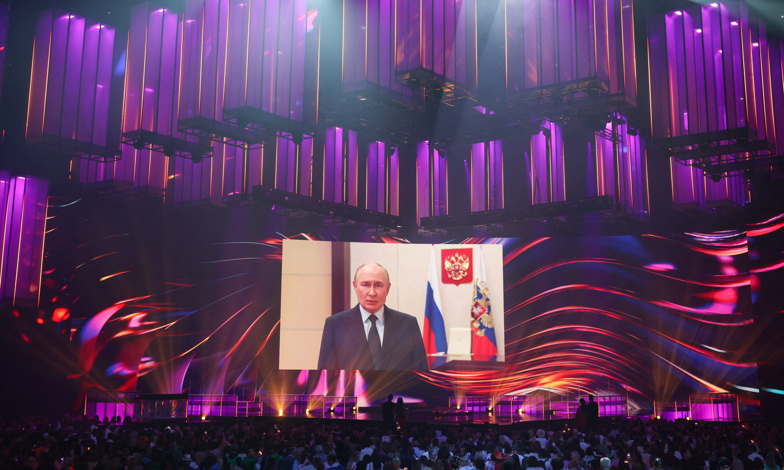 Vladimir Putin takes the floor during the intervision competition in Moscow