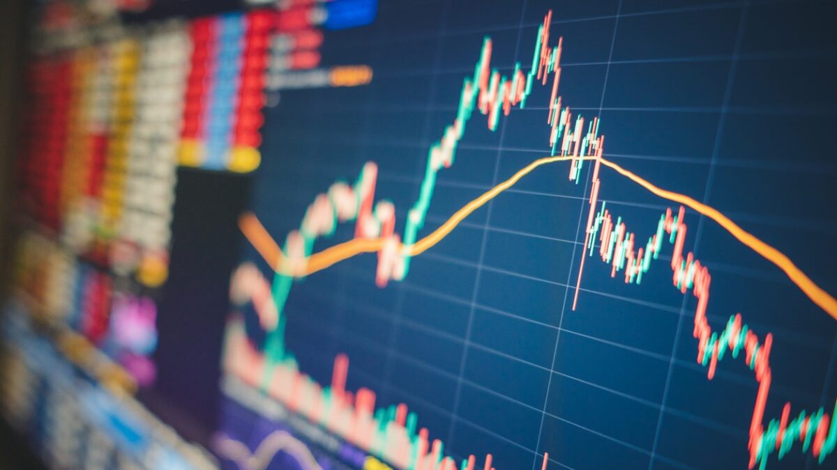Online business trade with mobile app using ticker bid - offer before fundamental analysis and financial graph in stockmarket forex cryptocurrency and commodity abstract background